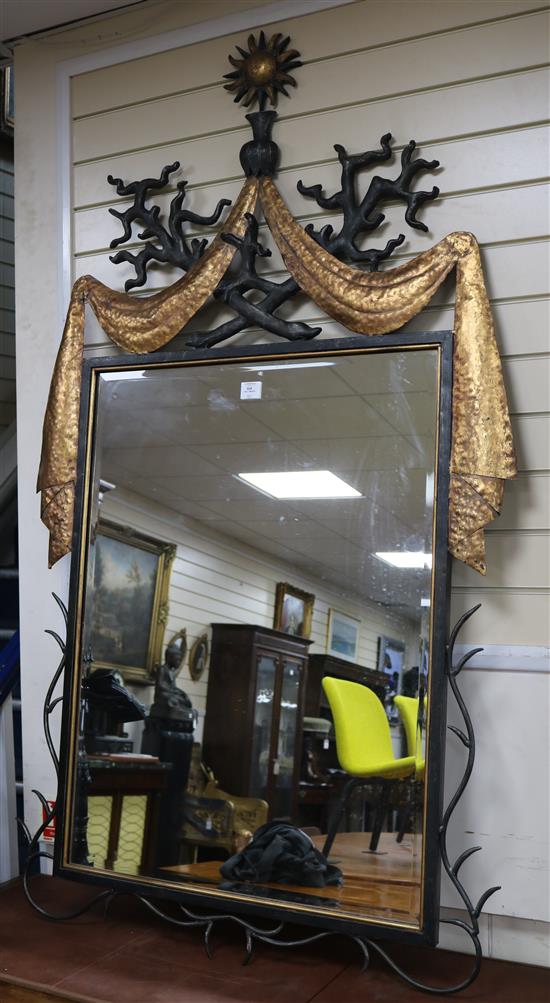 A wrought iron and gilt swag coral frame wall mirror W.101cm H.175cm